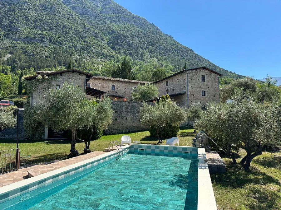 Historic stone castle and swimming pool in Abruzzo