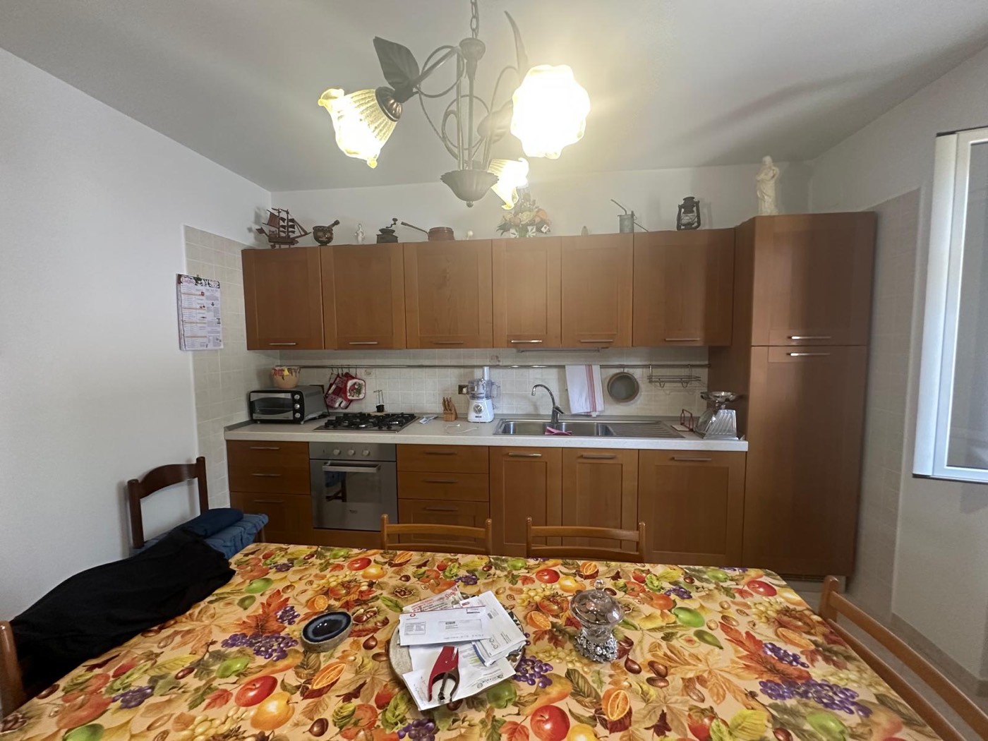 Kitchen and dining area — 1321