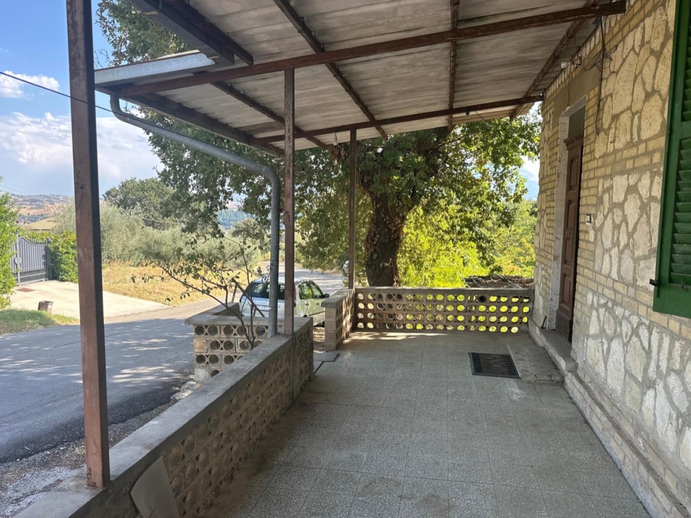 House exterior and covered porch — 1327