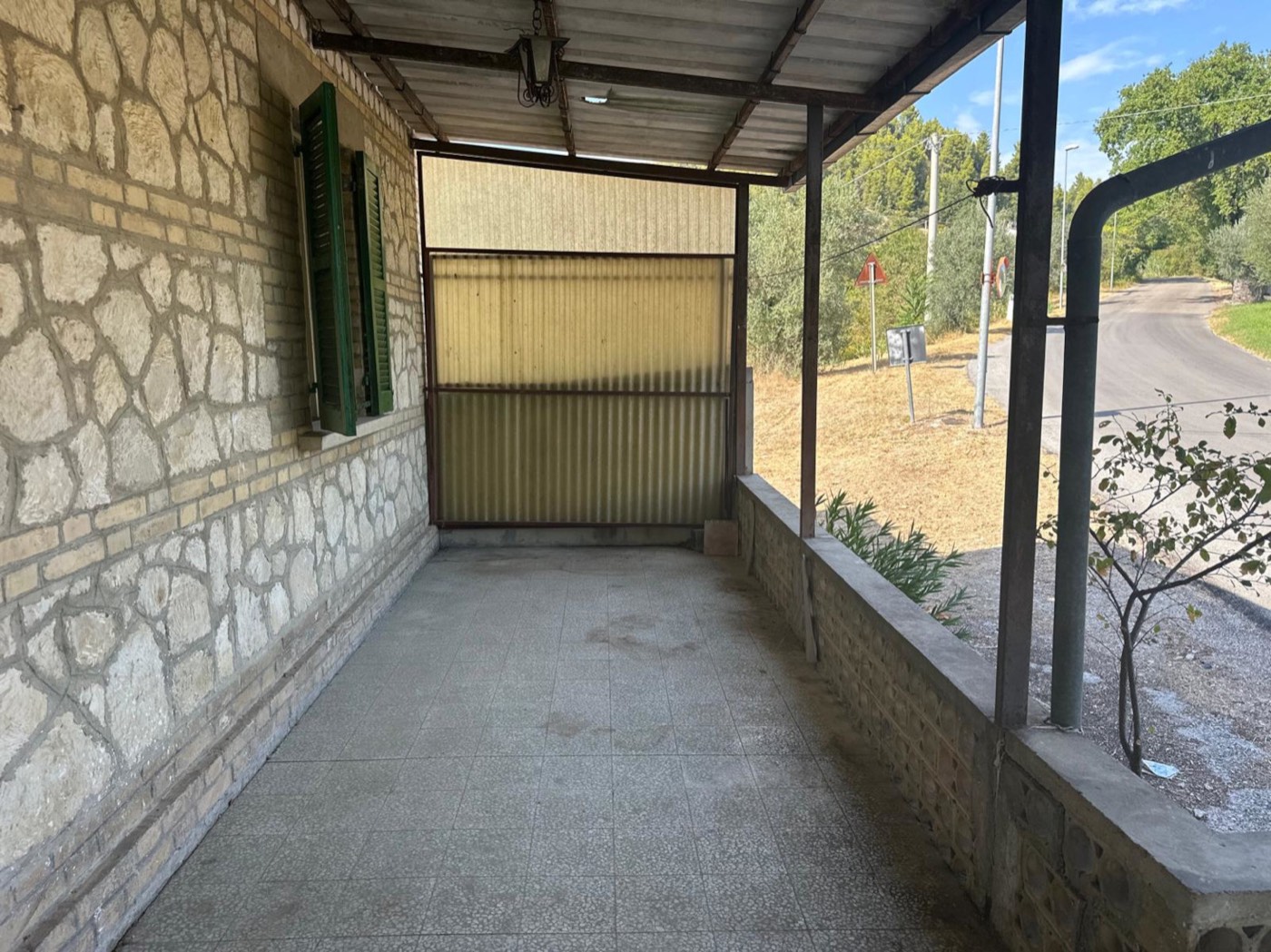 Covered porch and entrance door — 1327