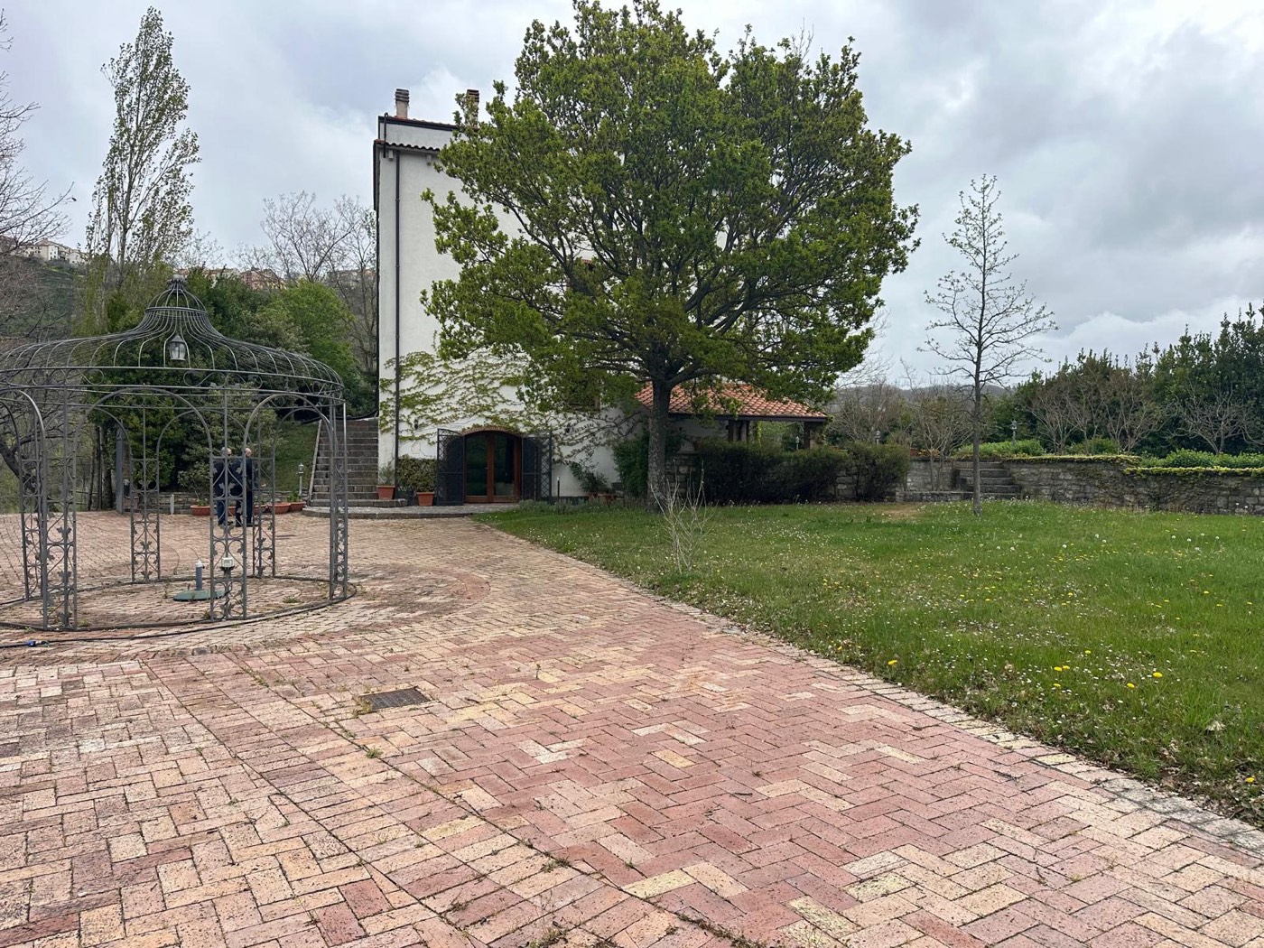 Villa entrance and paved outdoor area — 1329