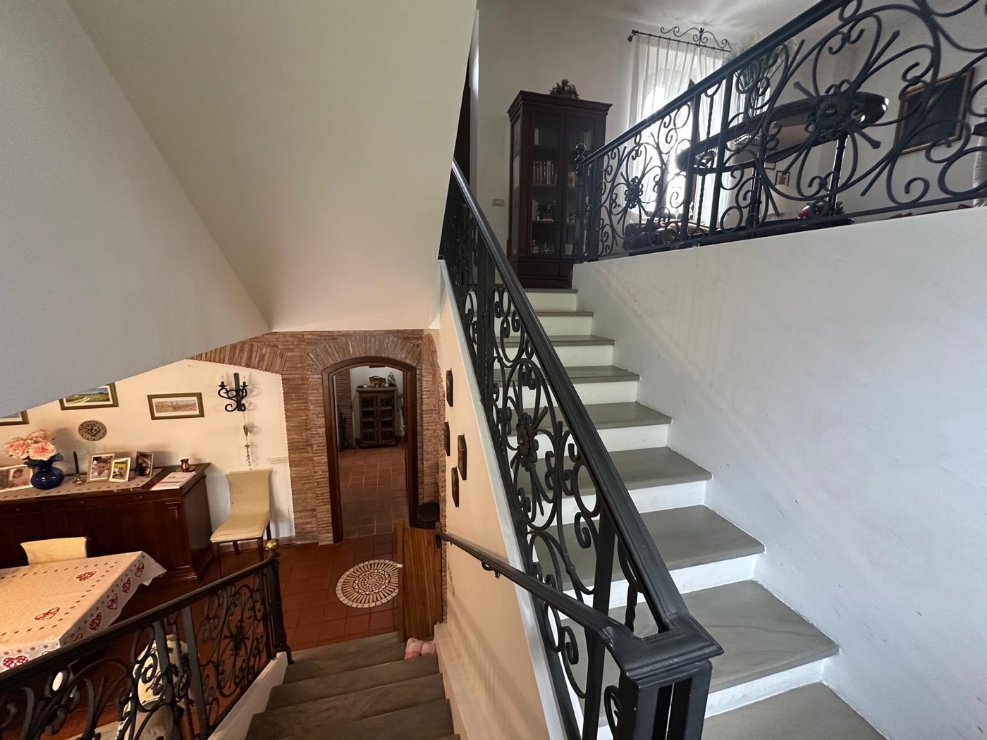 Furnished living areas and staircase — 1329
