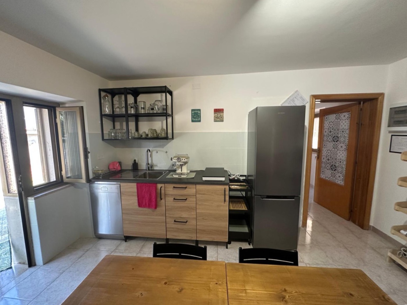 Kitchen and dining area — 1335