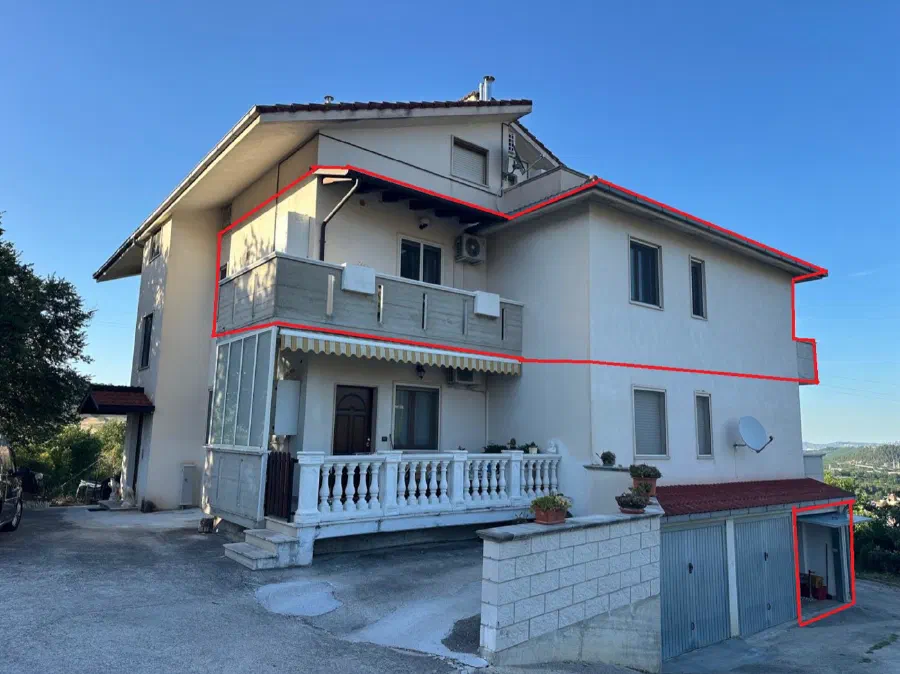 Apartment building in Scafa with balconies and garage level