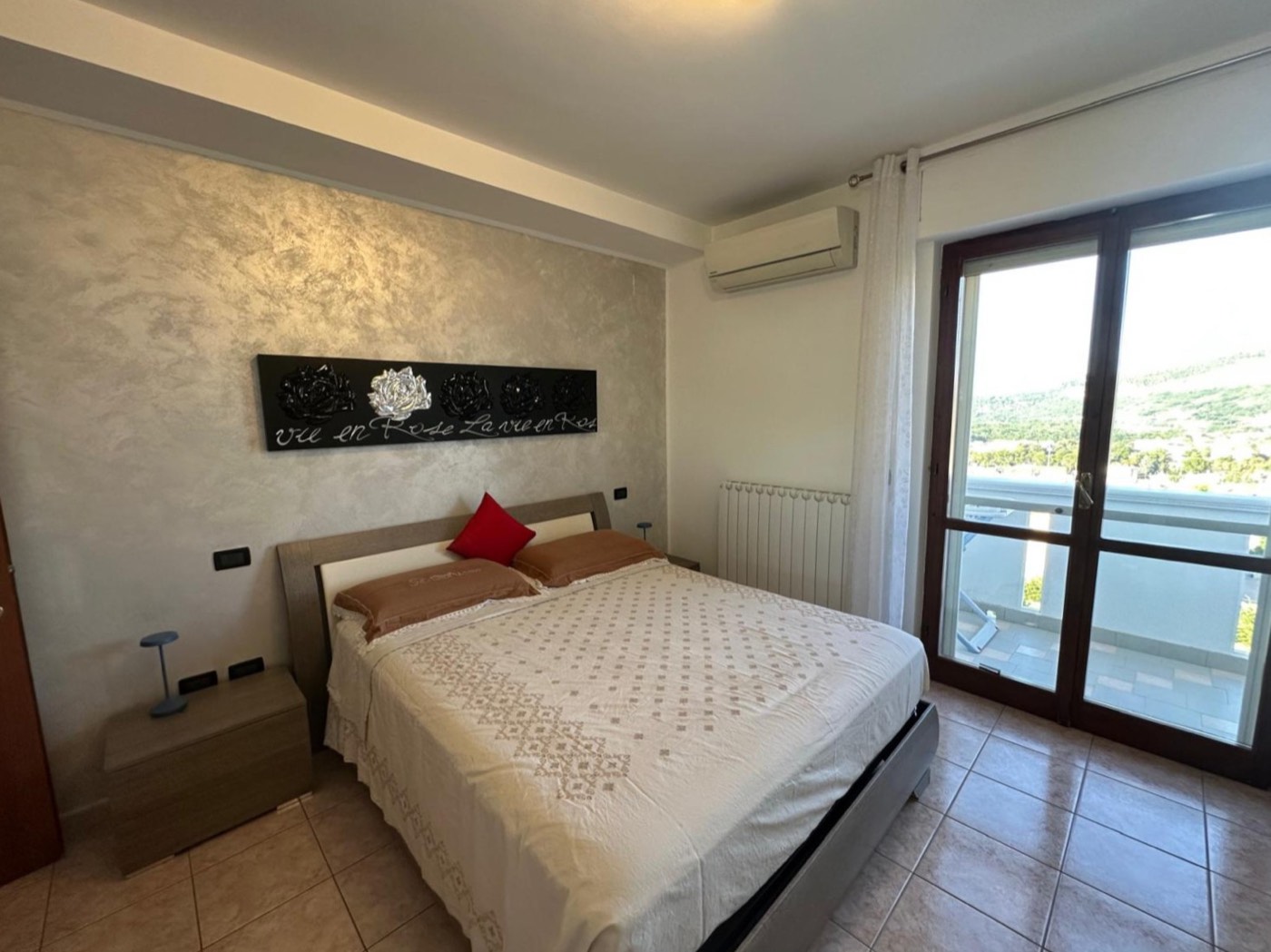 Main bedroom with balcony access — 1343